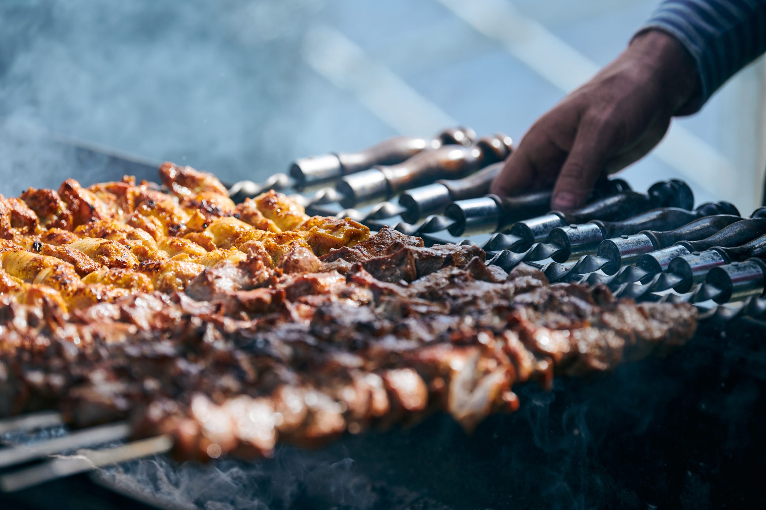 Attending a Halal Food Festival: What to Expect 5 cooking pork barbecue with skewers cubes of meat o 2025 03 16 11 02 01 utc scaled