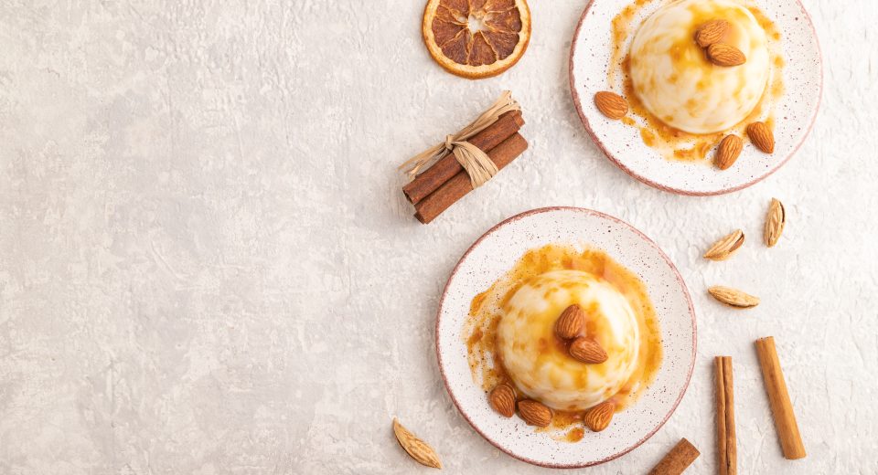 white milk jelly with caramel sauce on gray concre 2025 03 15 11 45 26 utc