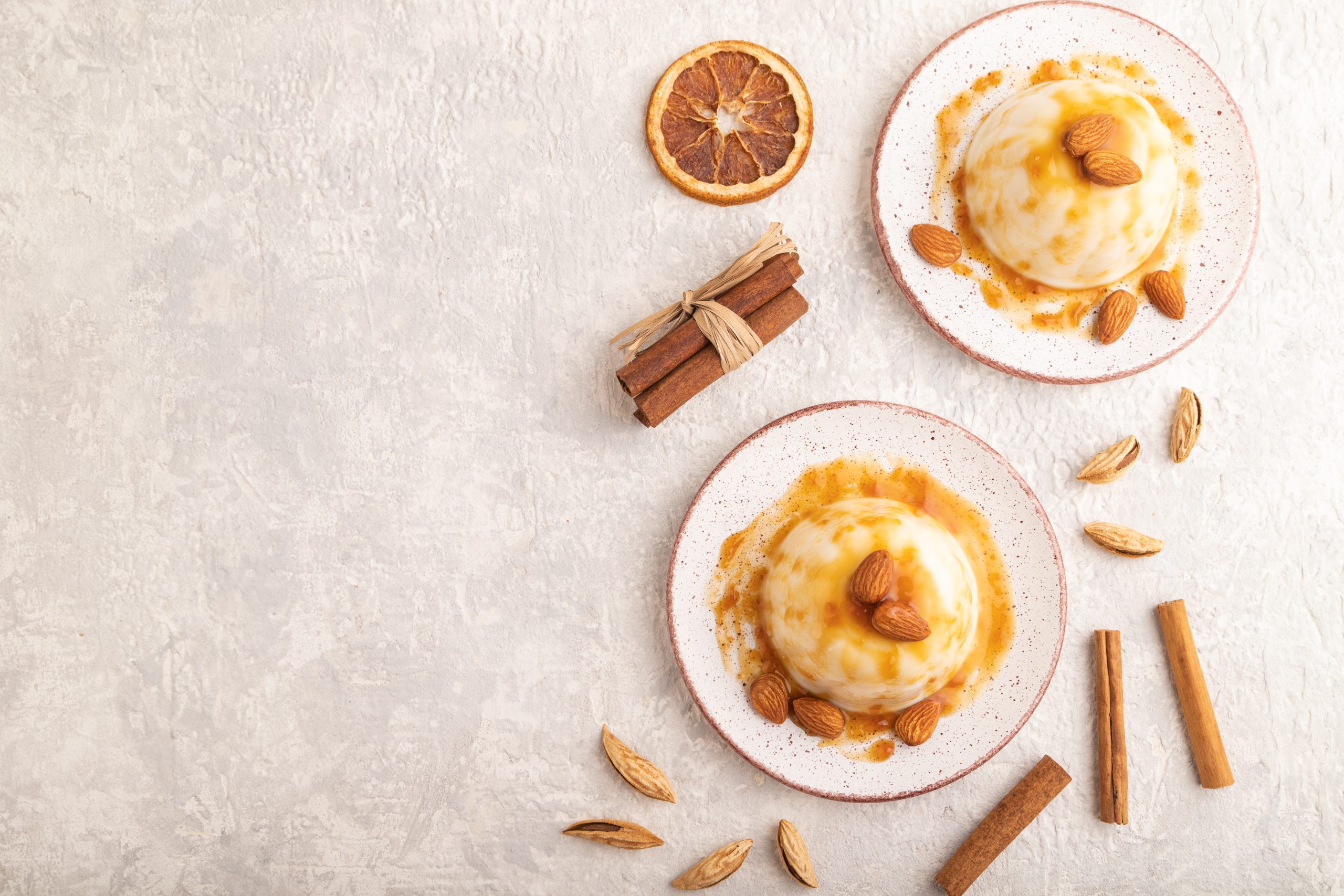 white milk jelly with caramel sauce on gray concre 2025 03 15 11 45 26 utc scaled