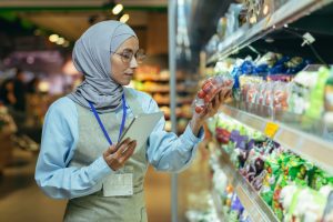 a muslim woman in a hijab a supermarket worker ch 2025 03 25 18 57 20 utc