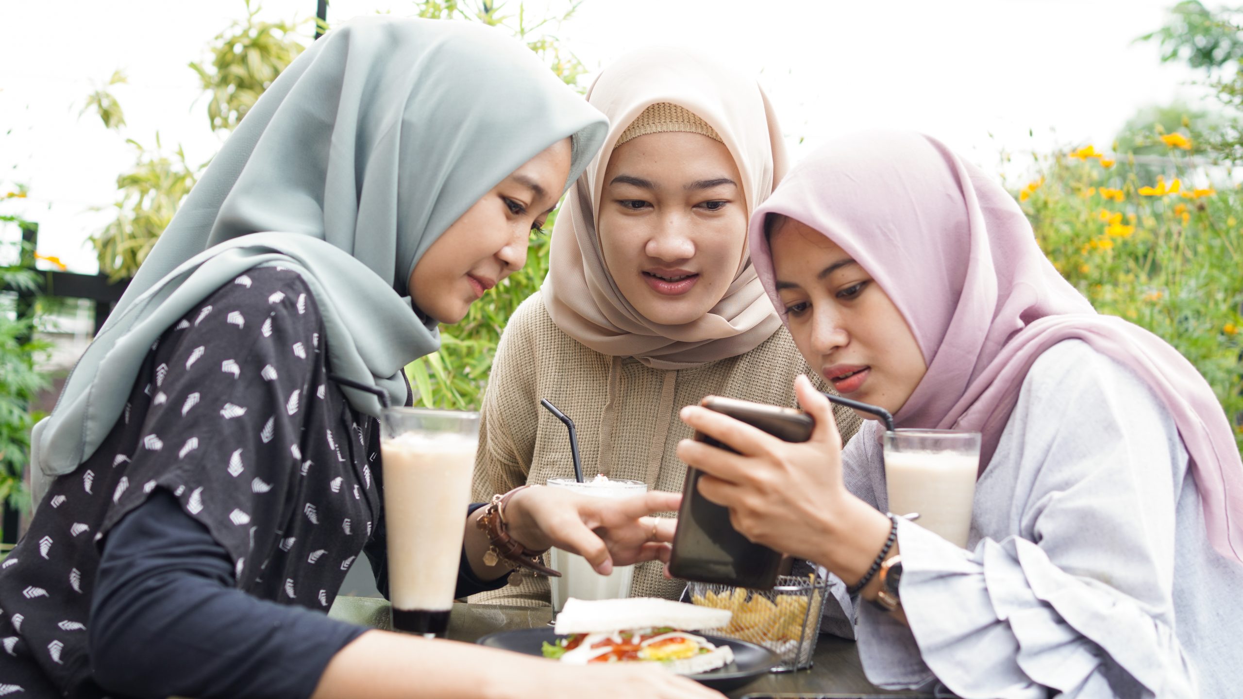 asian group hijab woman smilling in cafe with frie 2025 01 10 15 20 28 utc scaled