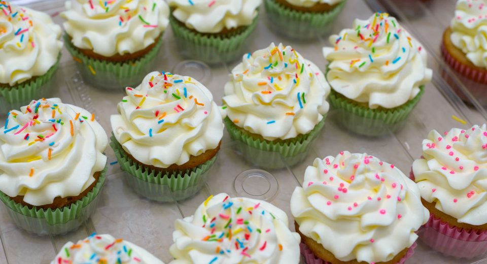 cupcakes decorated with cream cheese frosting and 2025 03 11 04 21 45 utc