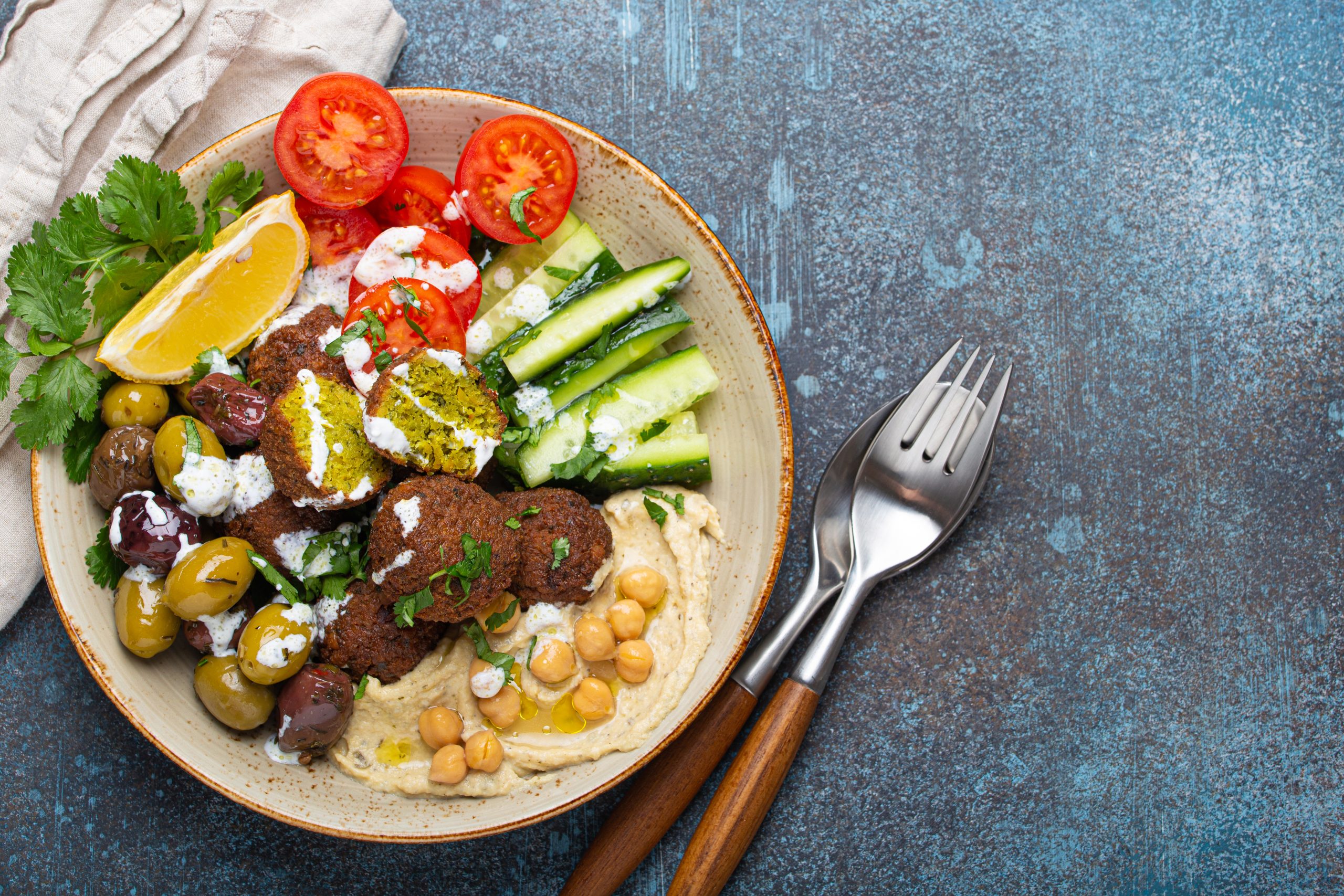 falafel salad bowl with hummus vegetables olives 2025 02 12 19 13 48 utc 1 scaled