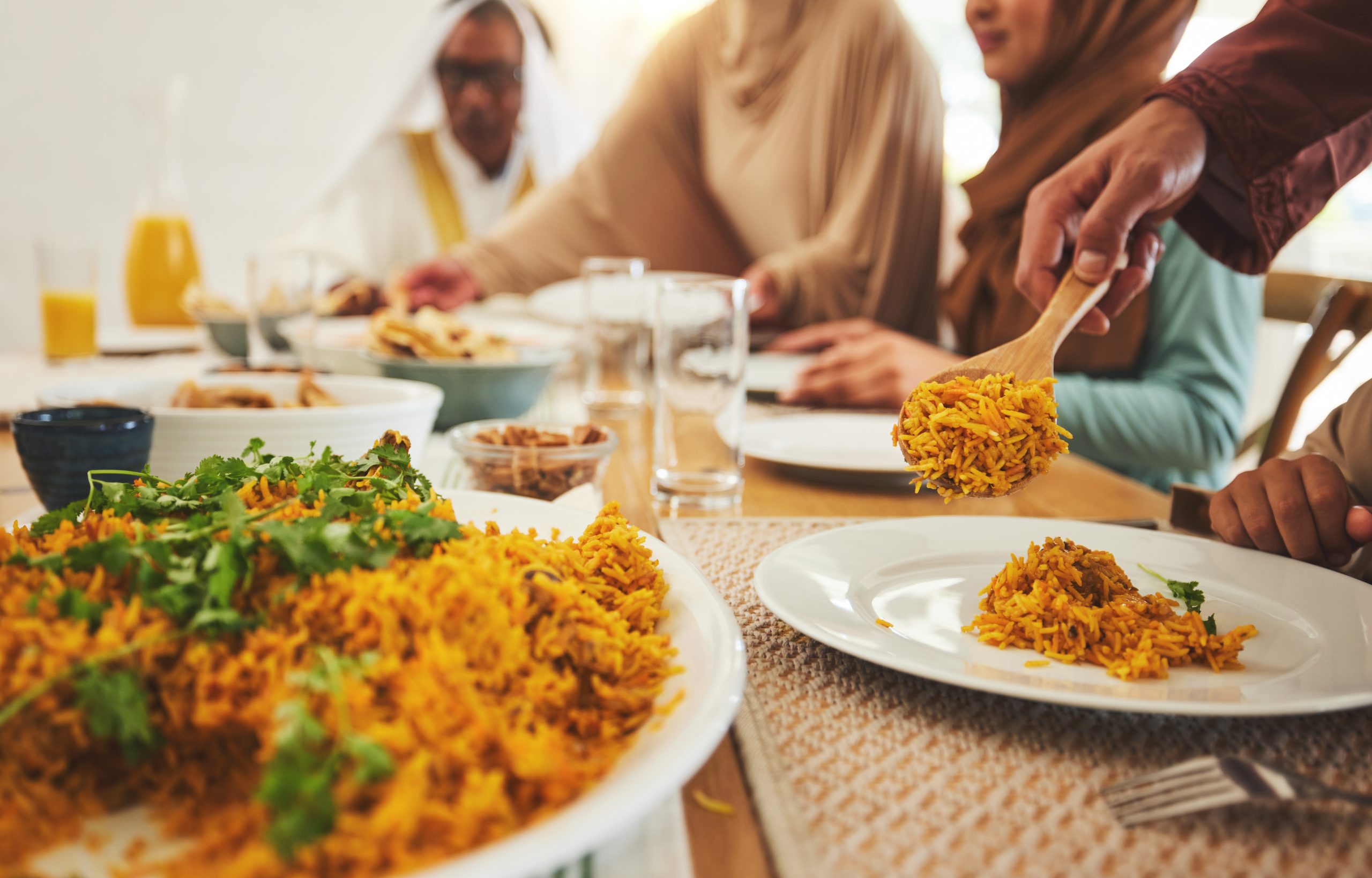 food closeup and muslim with big family at table 2025 04 06 11 08 16 utc scaled