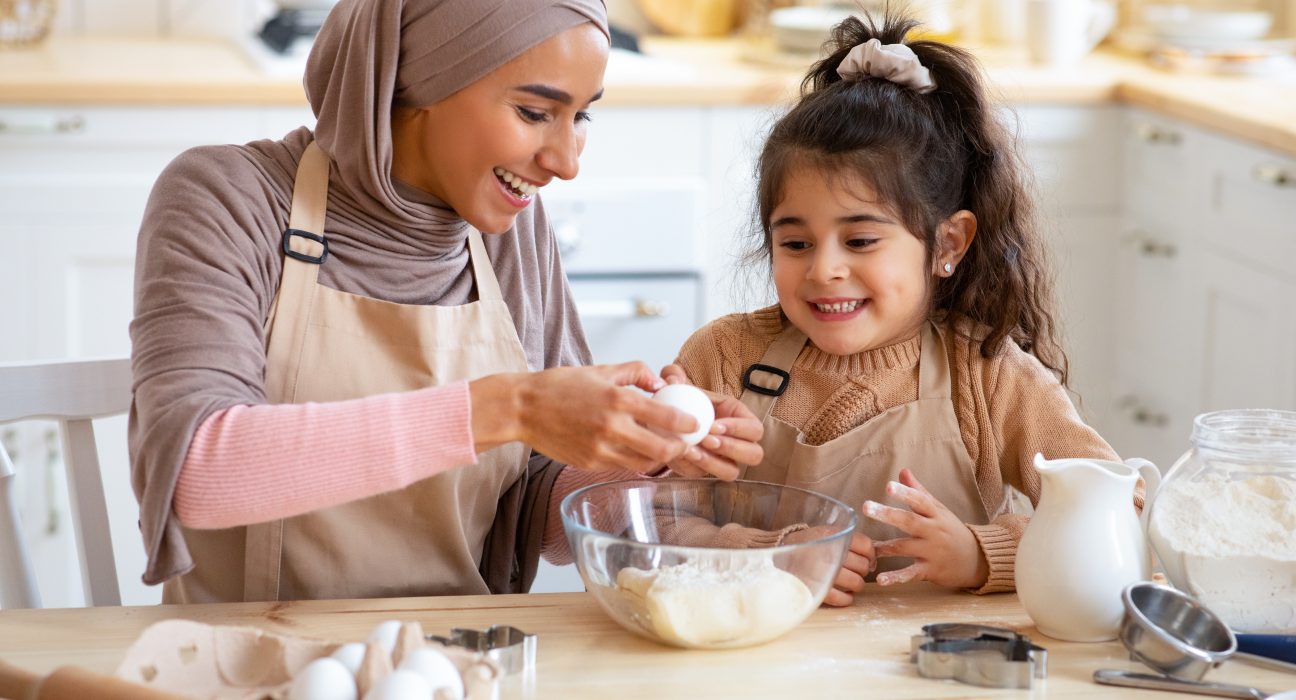 happy little girl and muslim mom having fun while 2025 03 18 18 15 52 utc