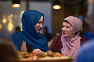 in a modern restaurant setting a woman in hijab e 2025 01 15 15 43 41 utc
