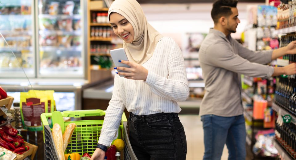 islamic lady doing grocery shopping using mobile p 2025 03 18 18 15 30 utc