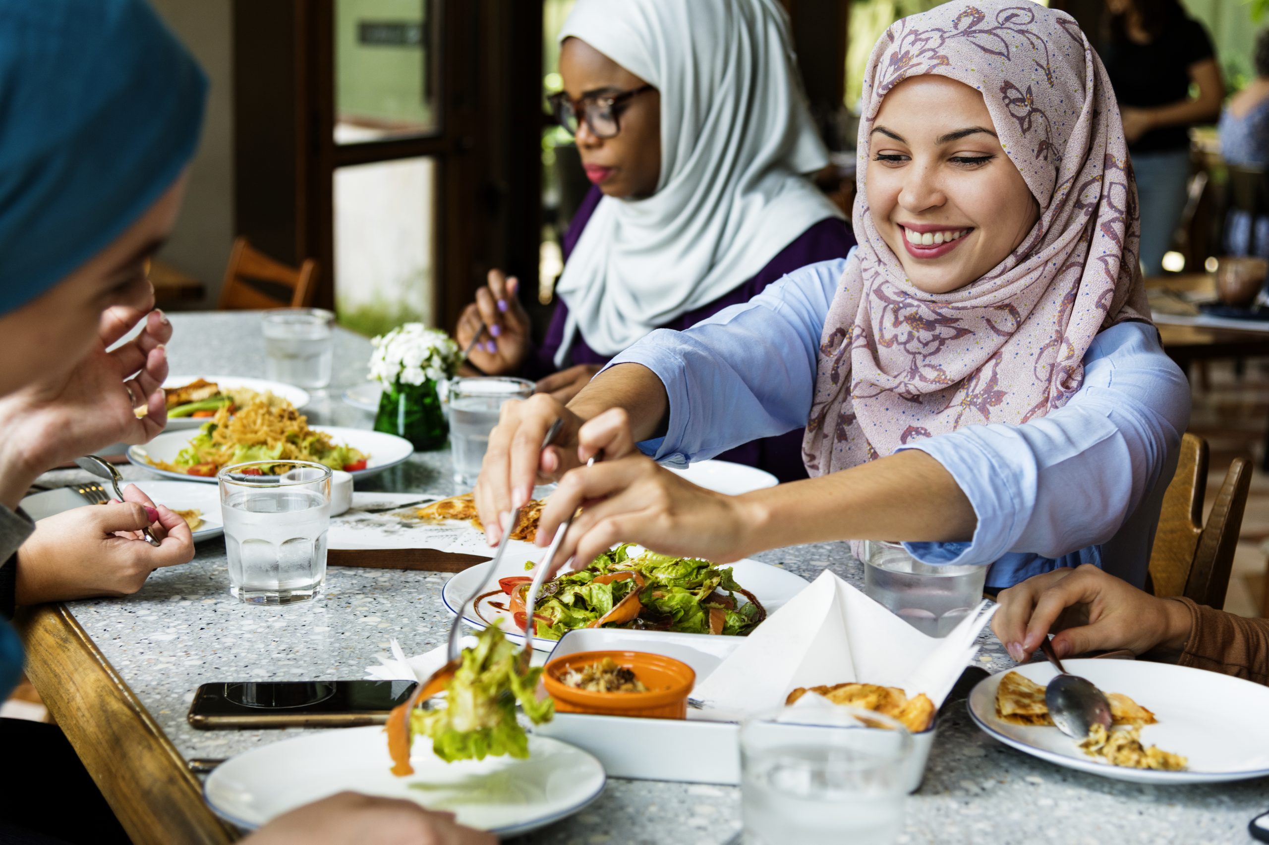 islamic women friends dining together with happine 2025 02 09 23 55 42 utc scaled