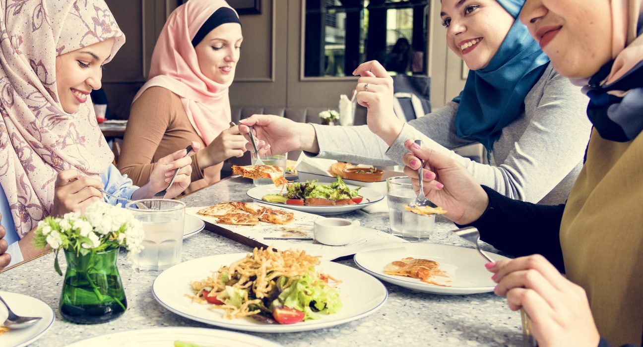 islamic women friends dining together with happine 2025 02 10 12 00 13 utc