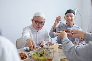 multi generation muslim family eating and sharing 2025 02 14 23 07 21 utc