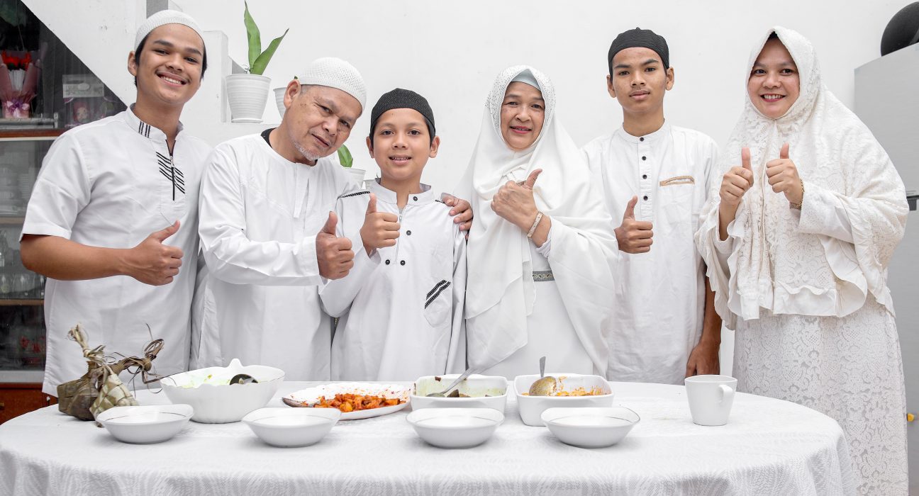 muslim family showing thumbs up on eid moment 2025 03 14 23 14 48 utc