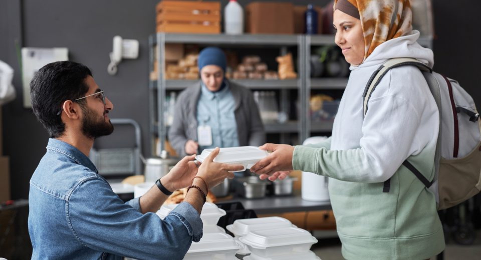 Major Halal Certification Bodies Around the World 13 smiling middle eastern woman taking meal at soup k 2025 03 08 05 50 27 utc