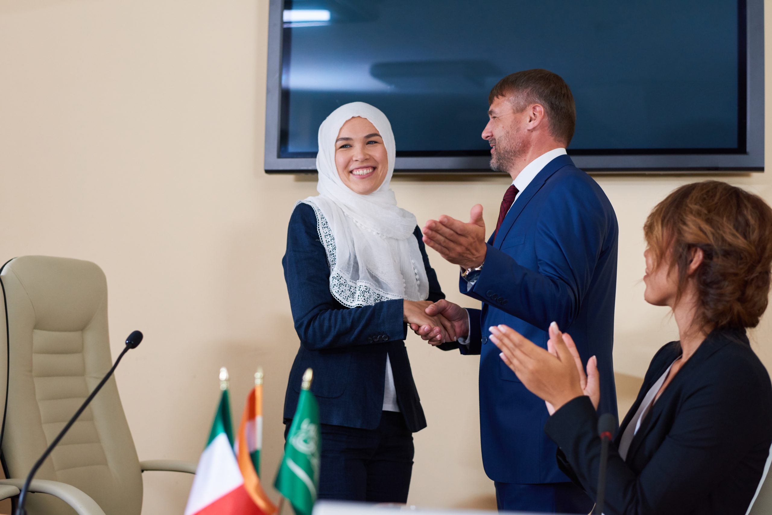 young confident businessman shaking hand of succes 2025 03 15 16 30 12 utc scaled