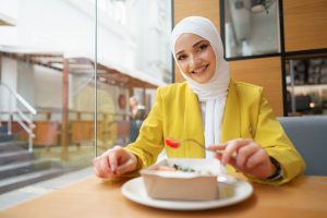 young muslim woman in hijab having a lunch in cafe 2025 02 24 12 30 17 utc